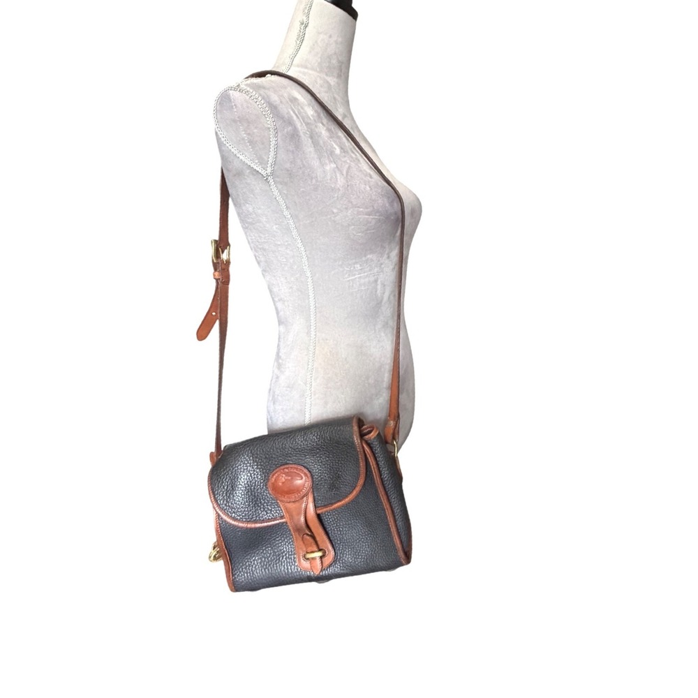 Dooney & Bourke All Weather Leather Vintage Navy  Crossbody Bag Brass Duck Fob